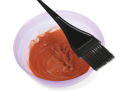 Image of hair coloring in a bowl with a brush